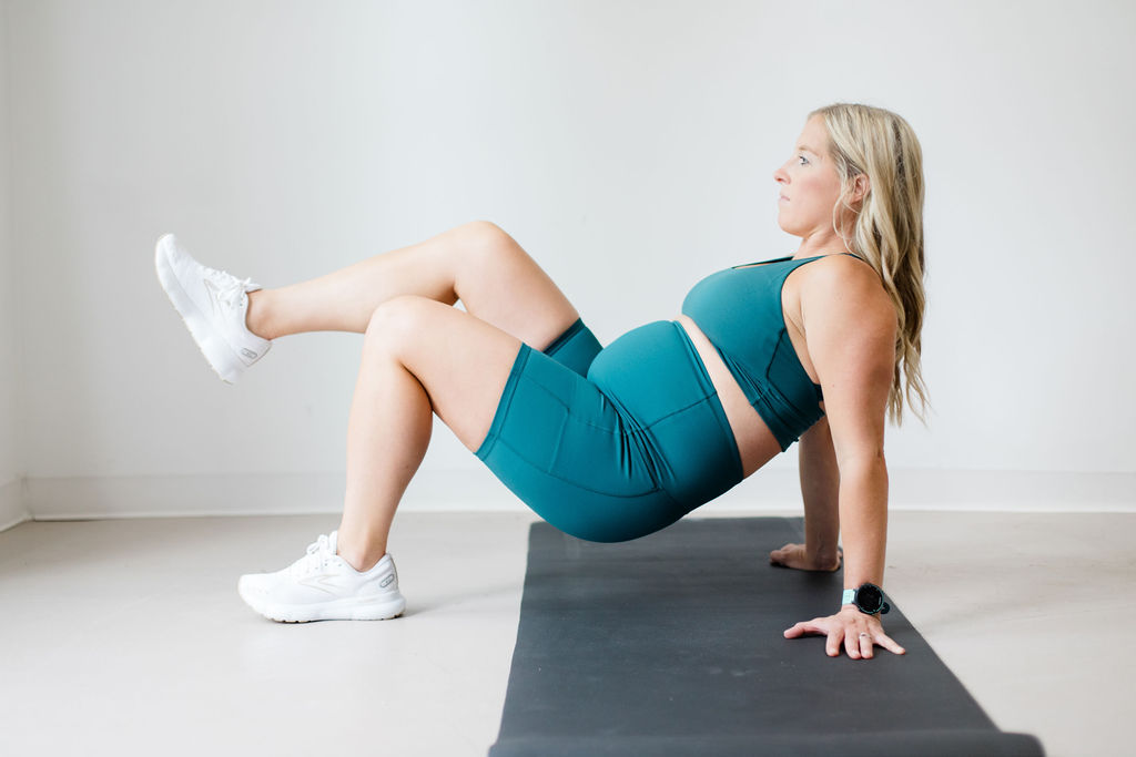 Pregnant woman exercising to relieve pelvic pain during pregnancy.