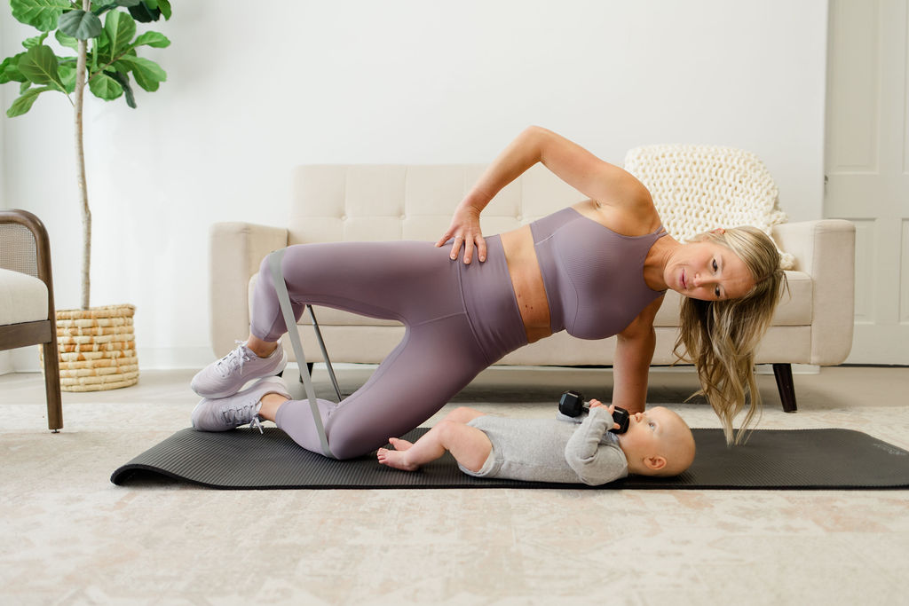 mom doing exercise to heal her pelvic floor and stop peeing when coughing/sneezing. 