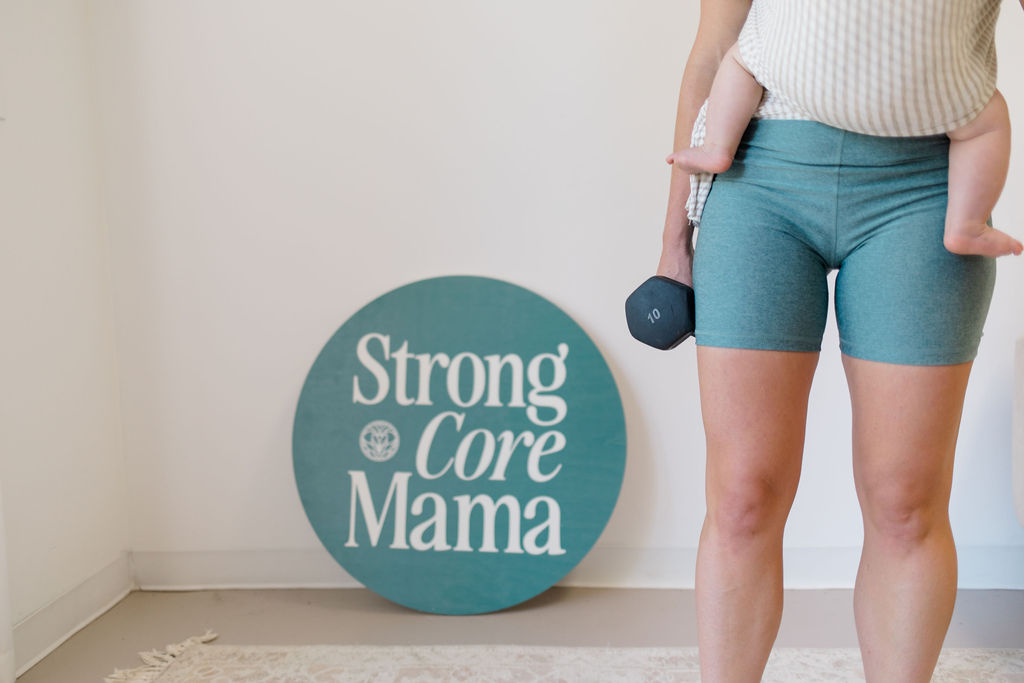 Pelvic floor physical therapist holding a weight and a baby in a carrier. 